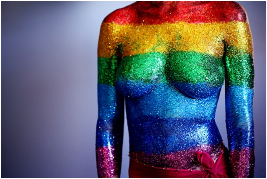 Naked woman with rainbow body paint